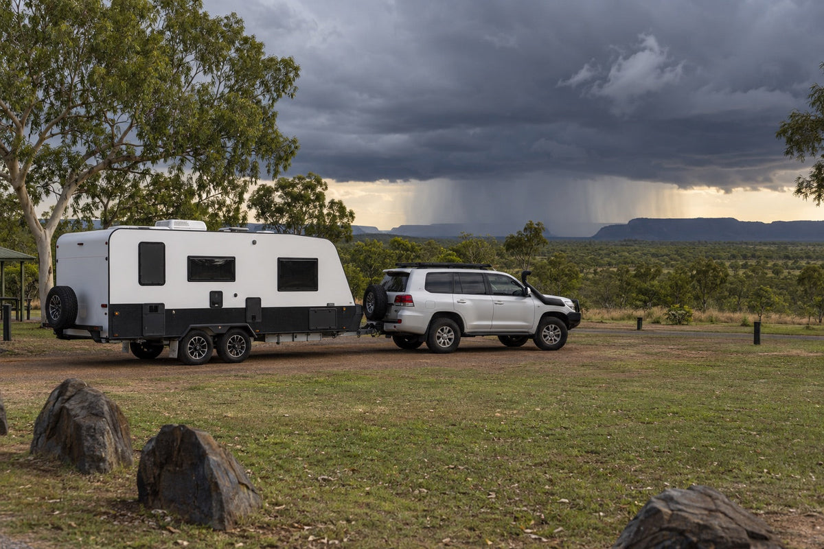 Hitched caravan prepared to leave a campground ahead of approaching severe weather