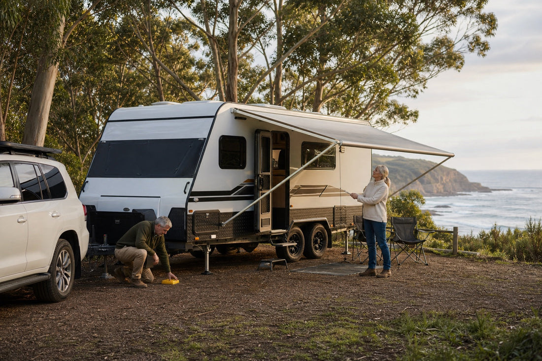Couple practising caravan setup at a coastal campground on the Great Ocean Road