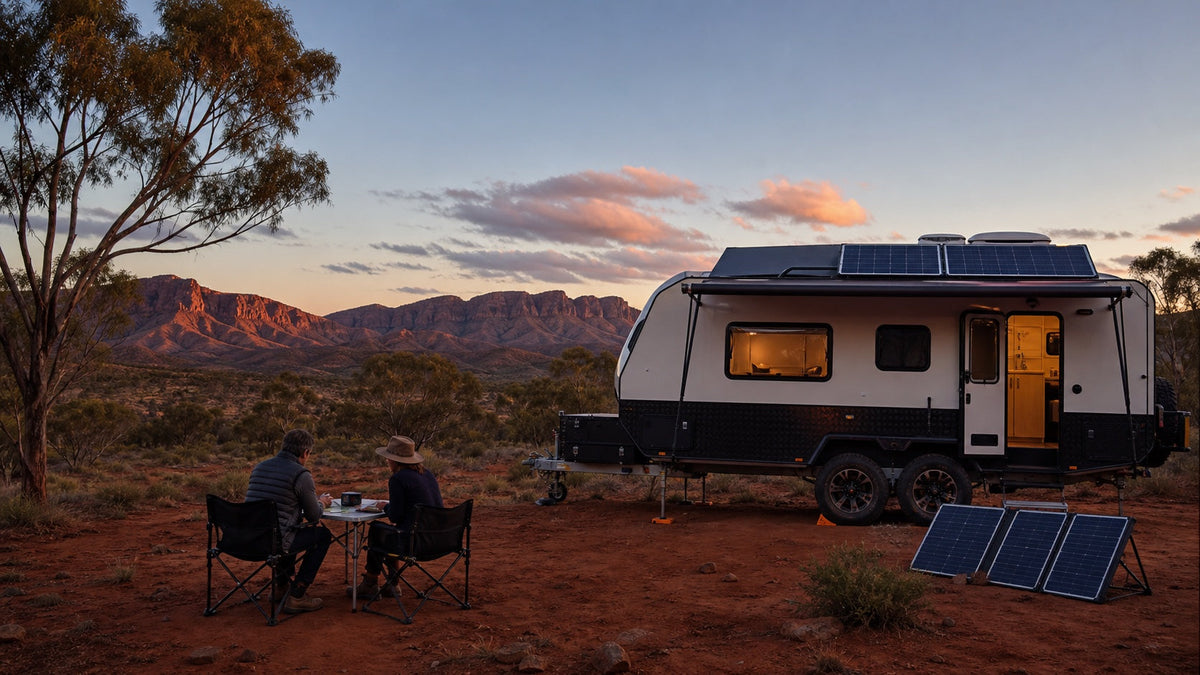Travellers reviewing off-grid power at a remote Australian caravan campsite
